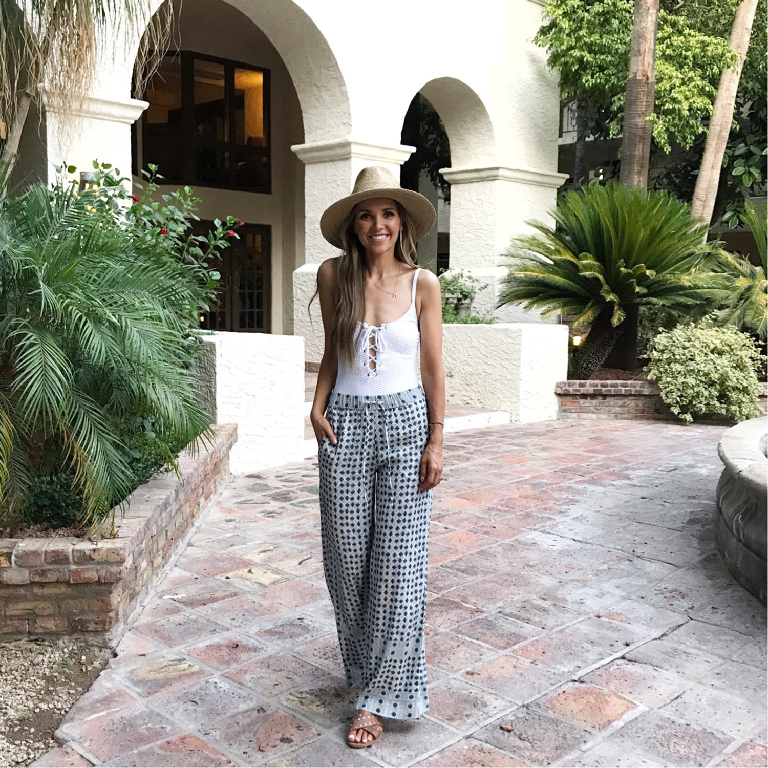 merricksat.com | White One-Piece Swimsuit and Wide Leg Pants