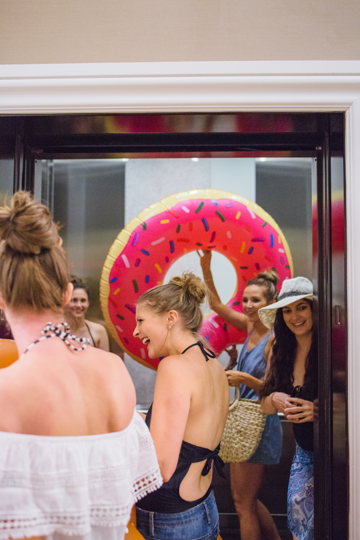 Trying to fit an inflatable donut pool float into the elevator