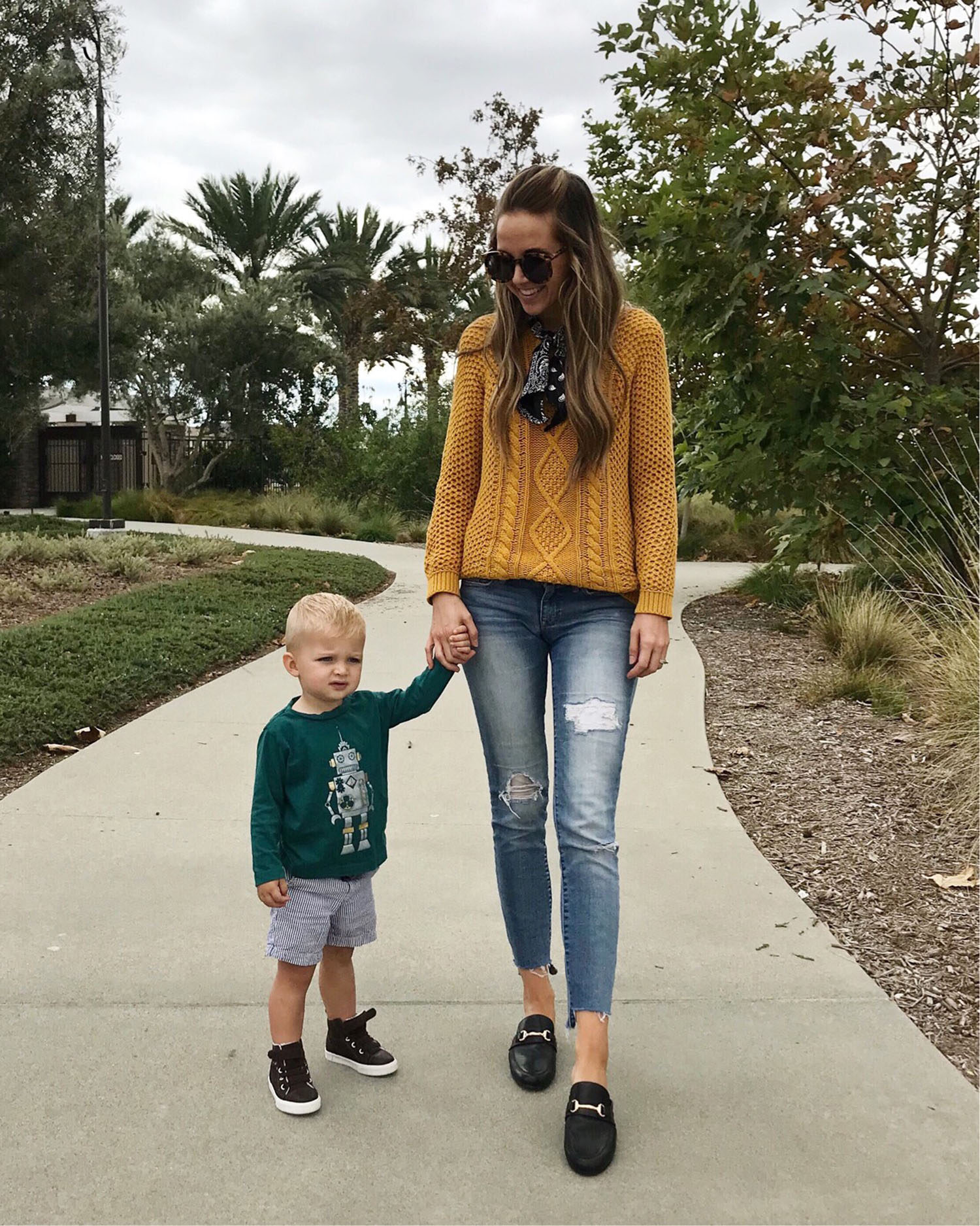 mustard sweater and distressed jeans | merricksat.com