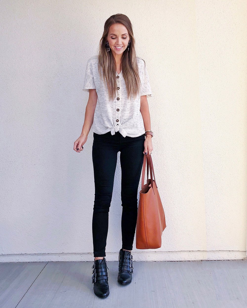 tie front top and black jeans