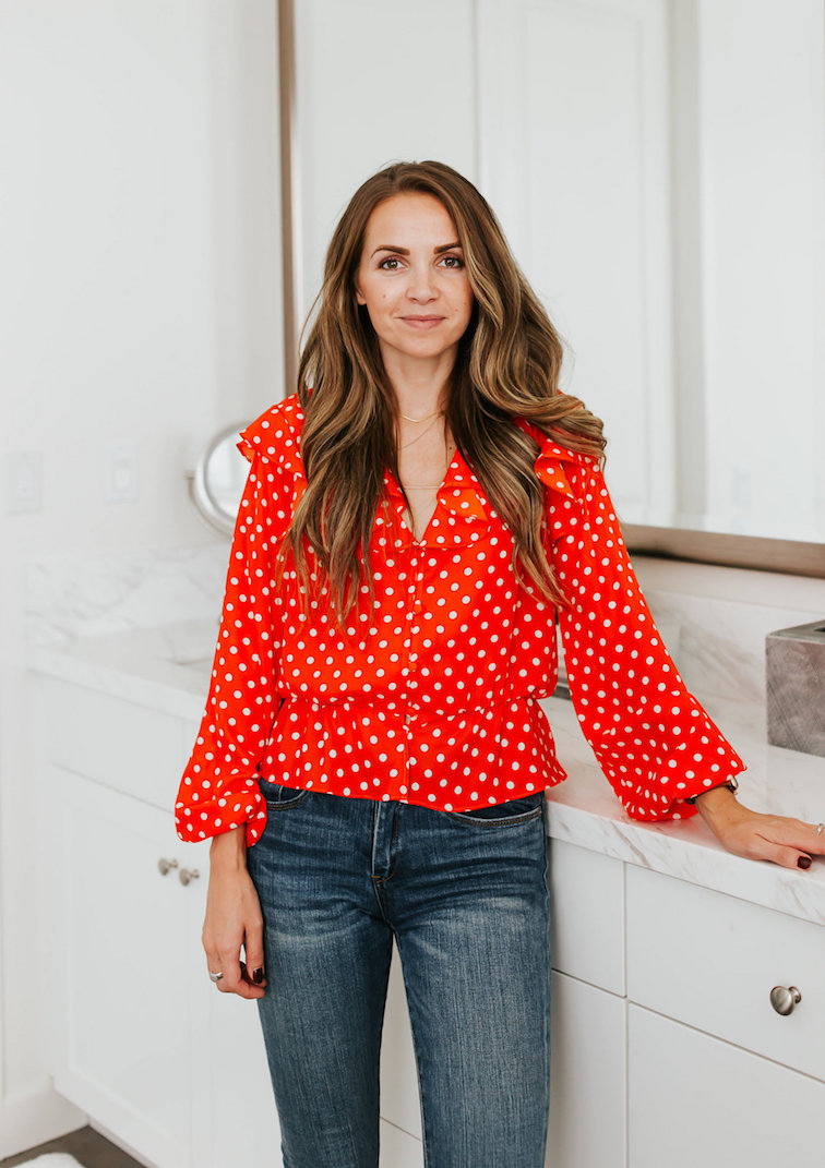 red polka dot shirt blue jeans no makeup