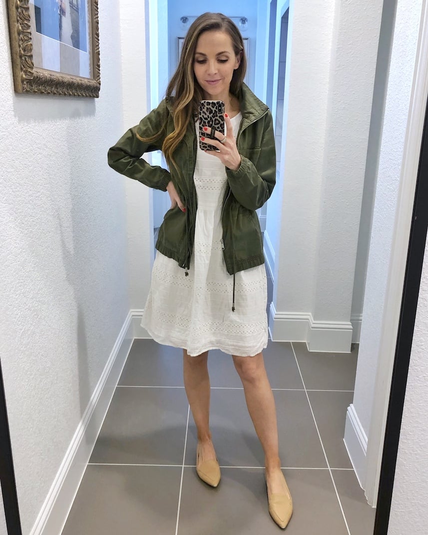 olive jacket with white dress and flats