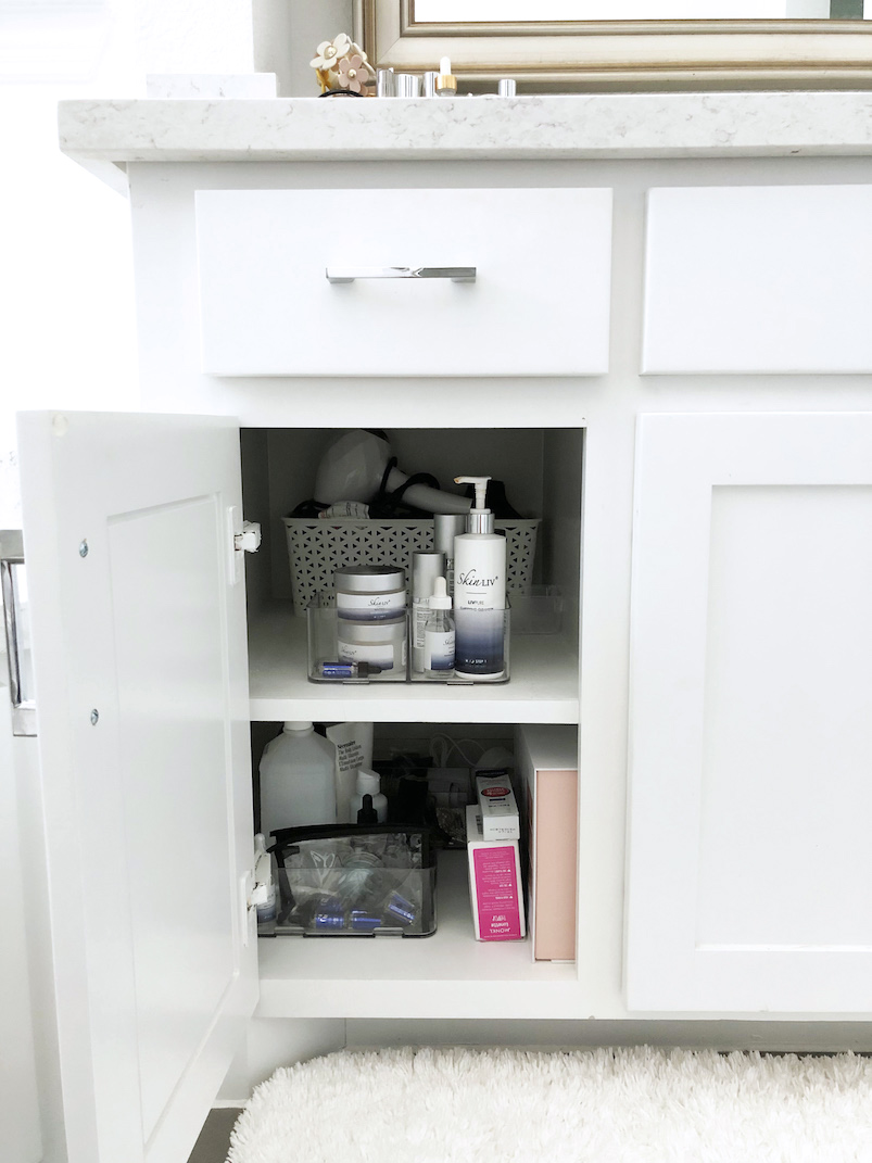 bathroom cupboard clean and organized