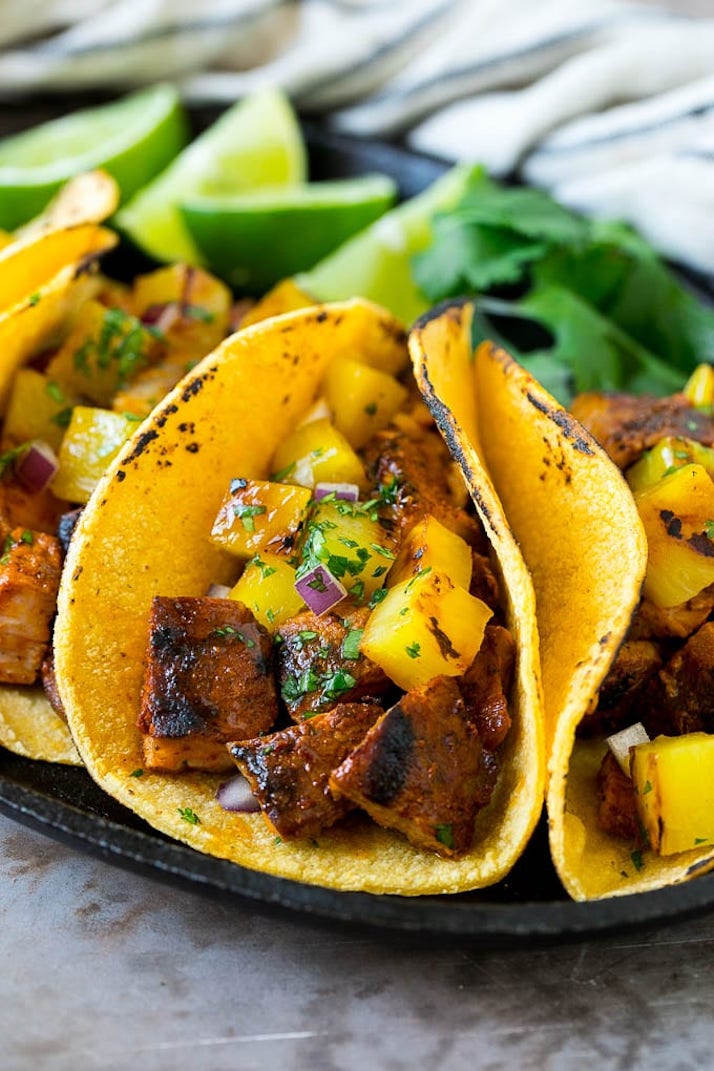 tacos al pastor in corn tortillas