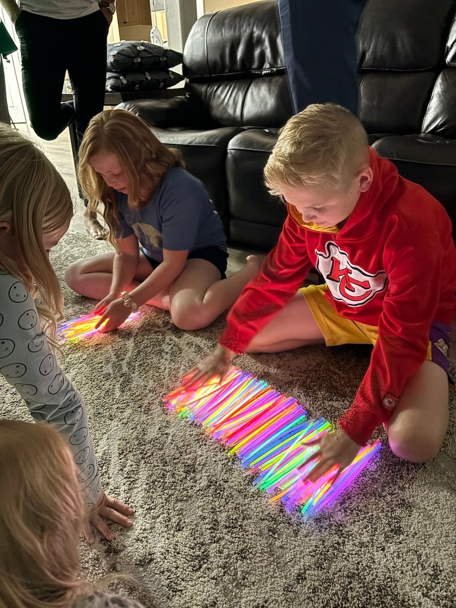 Family devotional at Bear Lake with Glow Sticks