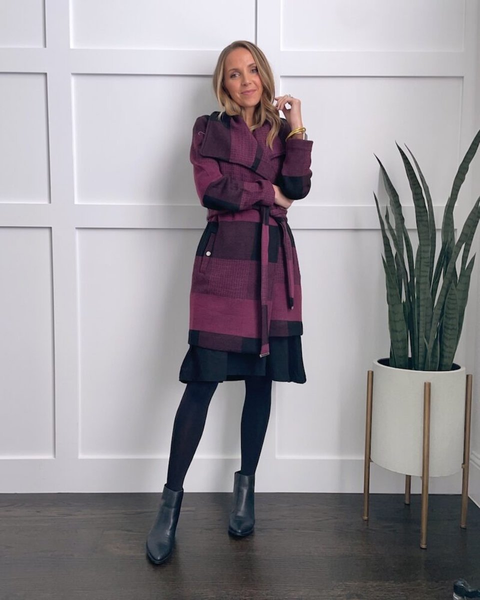 merricksart-black-dress-with-black-boots-black-tights-and-plaid-coat-e1670521516893