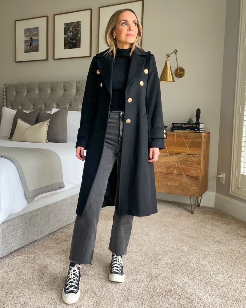 black coat with high top sneakers