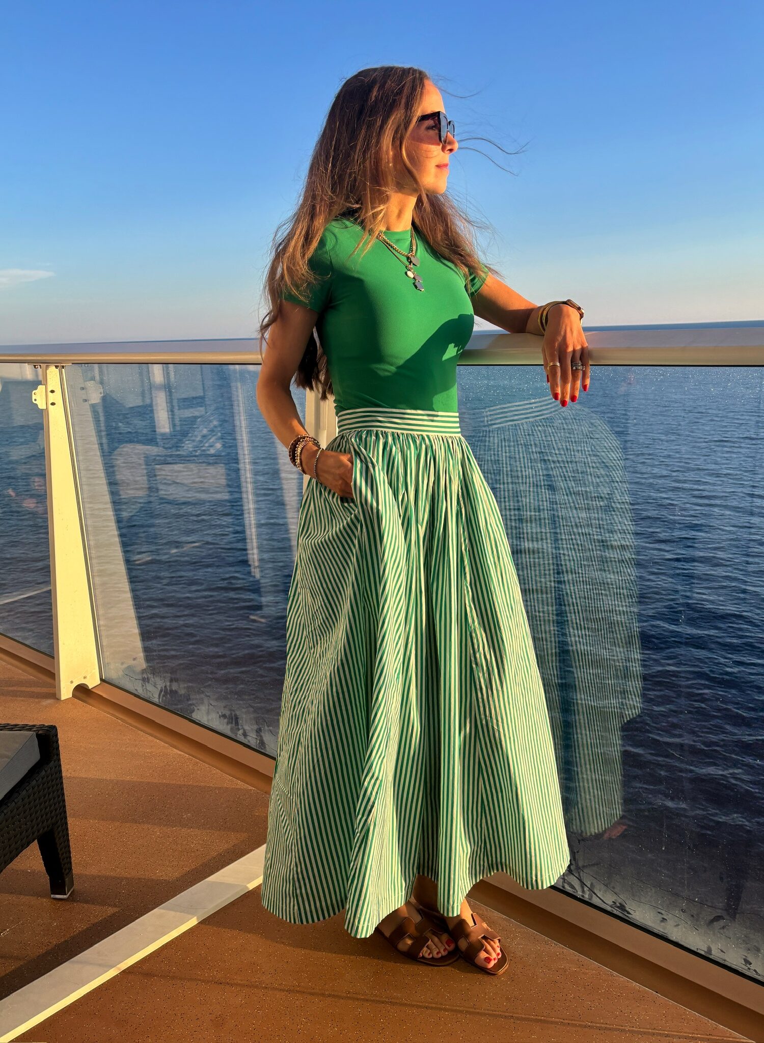 boden Kelly green stripe skirt, pumiey green tee, Hermes sandals